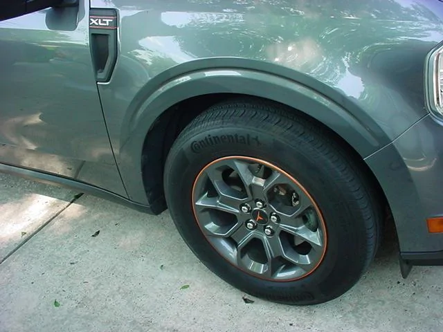 Ford Maverick OEM wheels with decals on them DSC05789