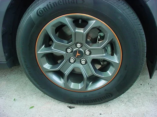 Ford Maverick OEM wheels with decals on them DSC05790