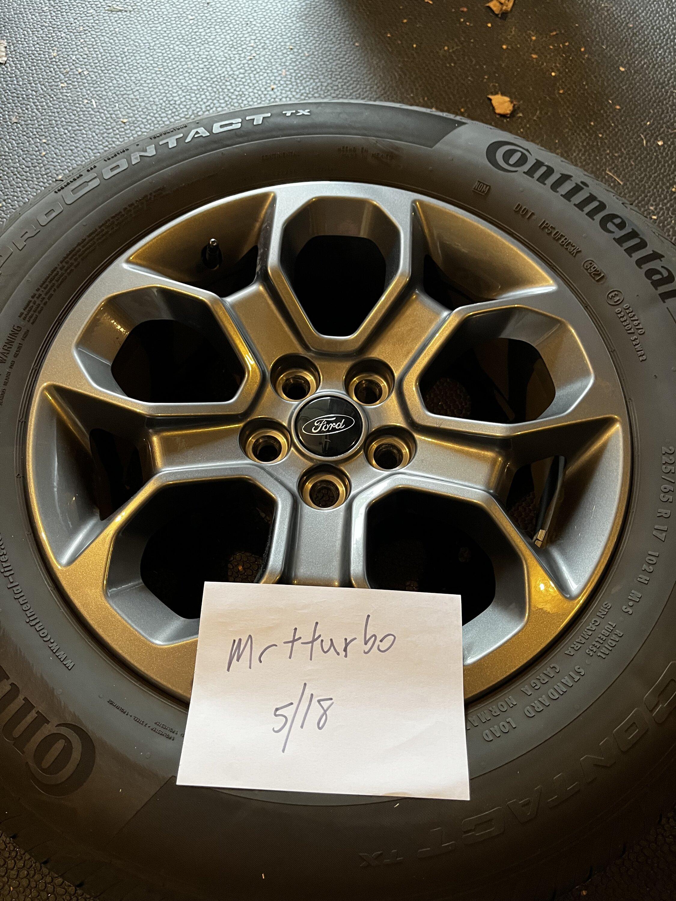 Ford Maverick Set of XLT takeoff wheels and tires $650 IMG_2186