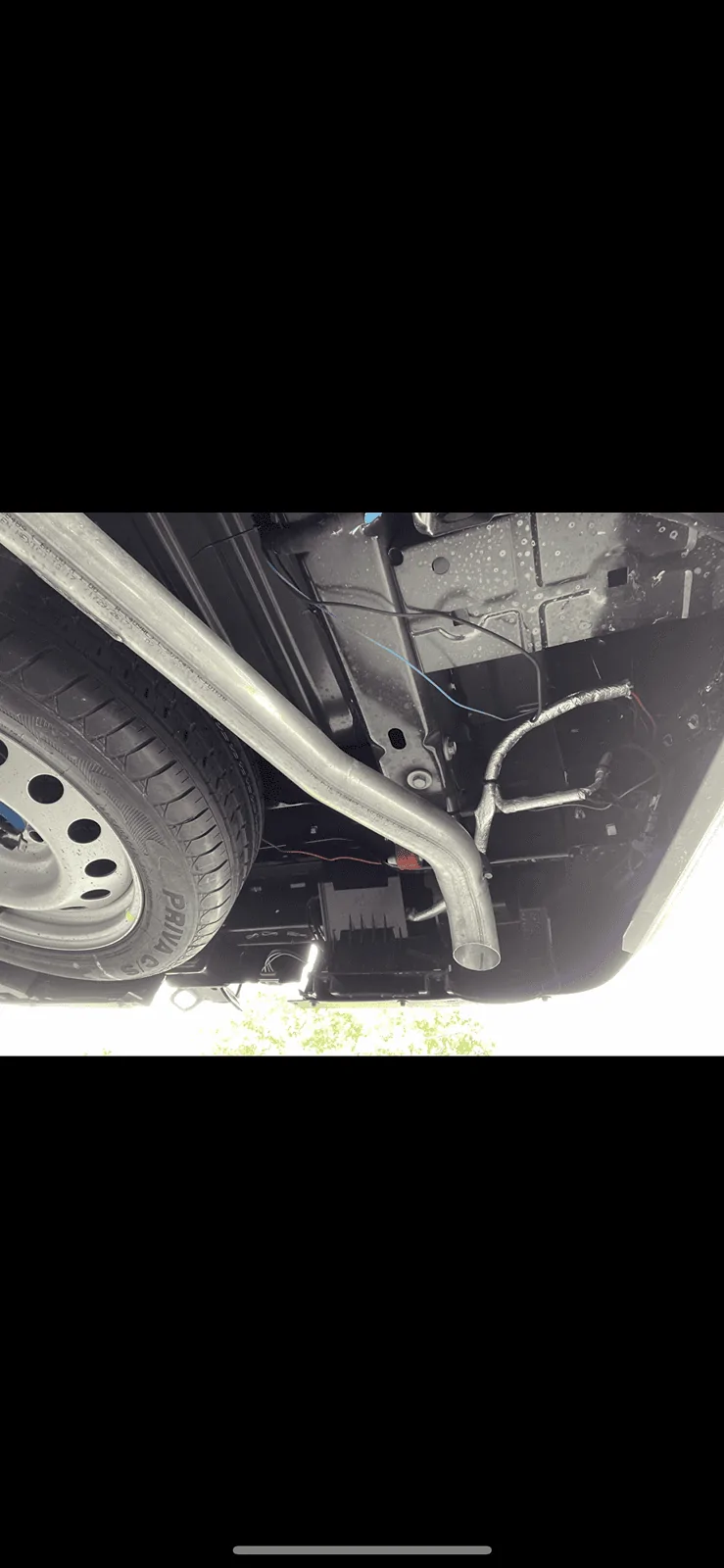 Ford Maverick Missing Splash Guard Above Rear Left Tire? exposed Wires? 1E1288CA-210B-47B9-9767-28EF8E81100B