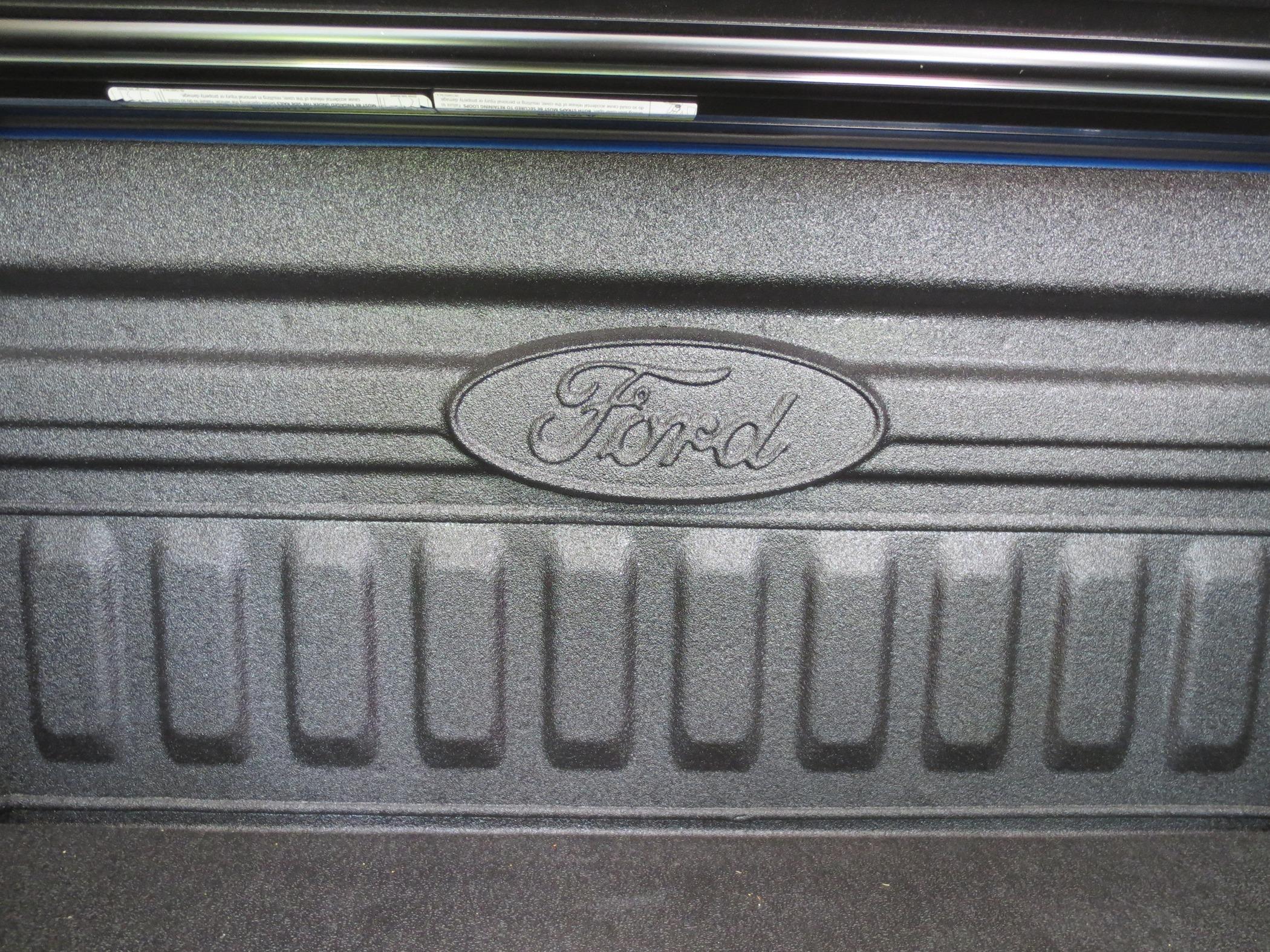 Ford Maverick Ford Emblem on Back Side of Bed IMG_2582.JPG