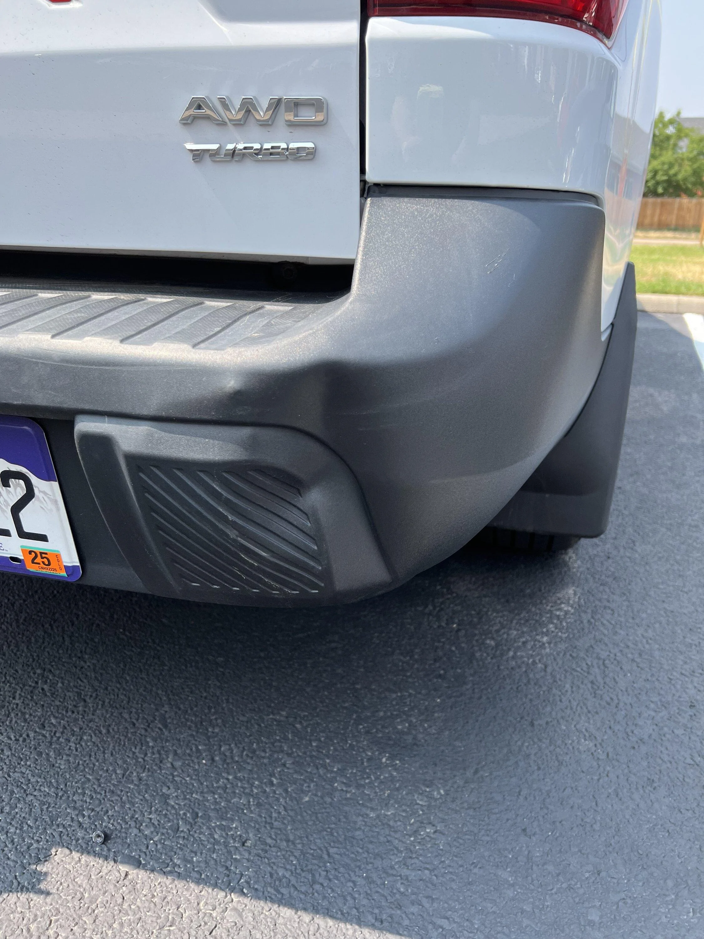 Ford Maverick REAR BUMPER DENT IMG_1002