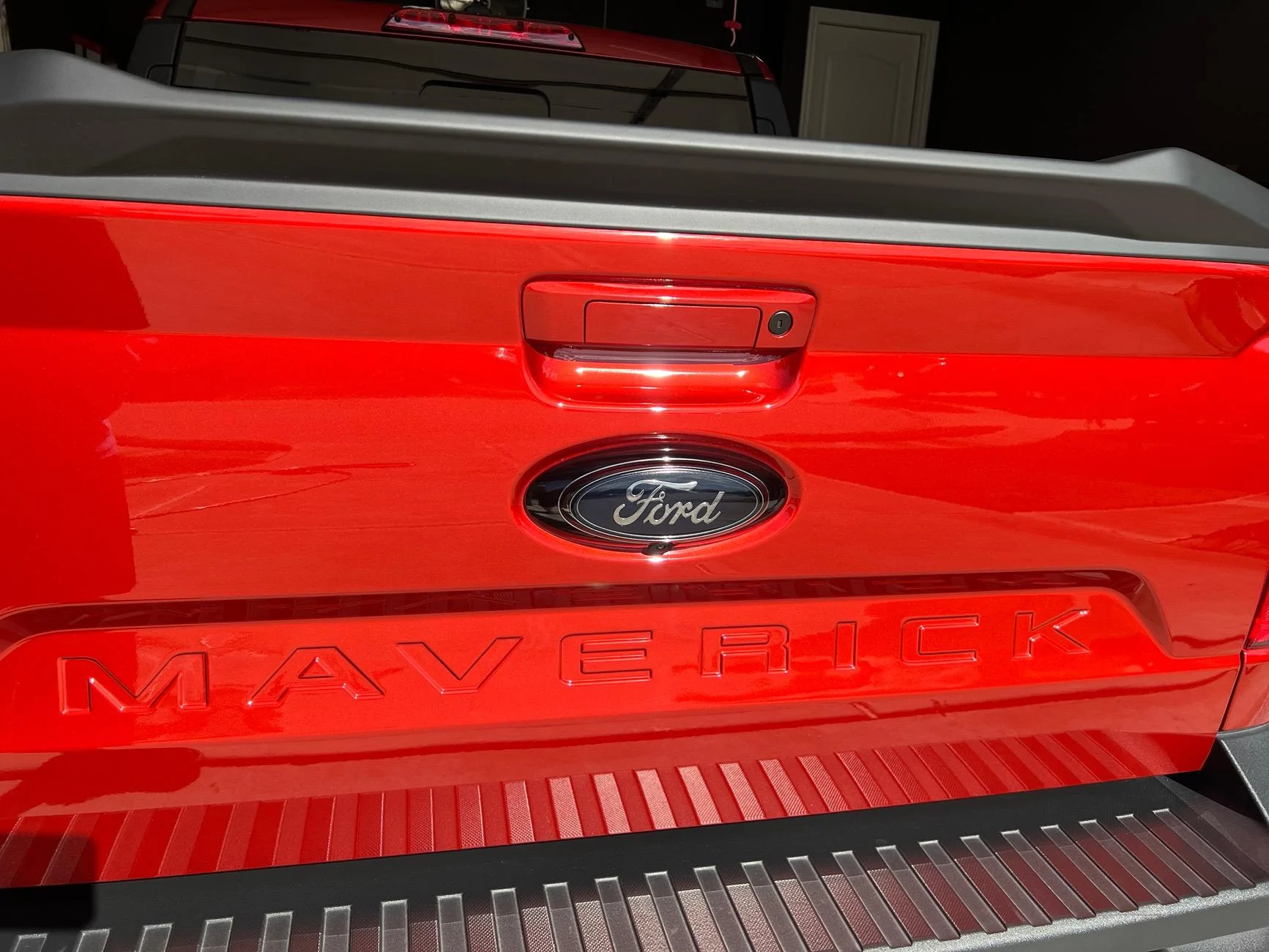 Ford Maverick Paint matched tailgate handle and painted tailgate emblem IMG_0919