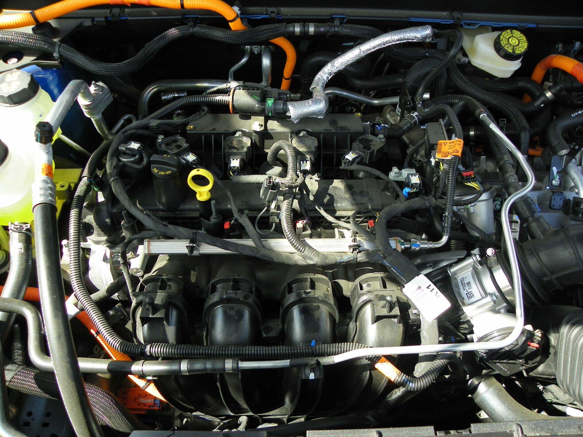 Ford Maverick TX State Fair Auto Show Hybrid Engine #3.JPG