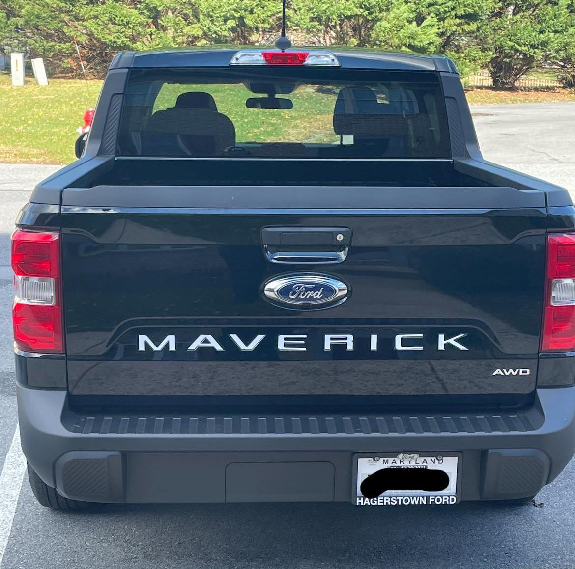 Ford Maverick SHADOW BLACK Maverick Photos Thread Shadow Black 2022 Ford Maverick white tailgate letterin