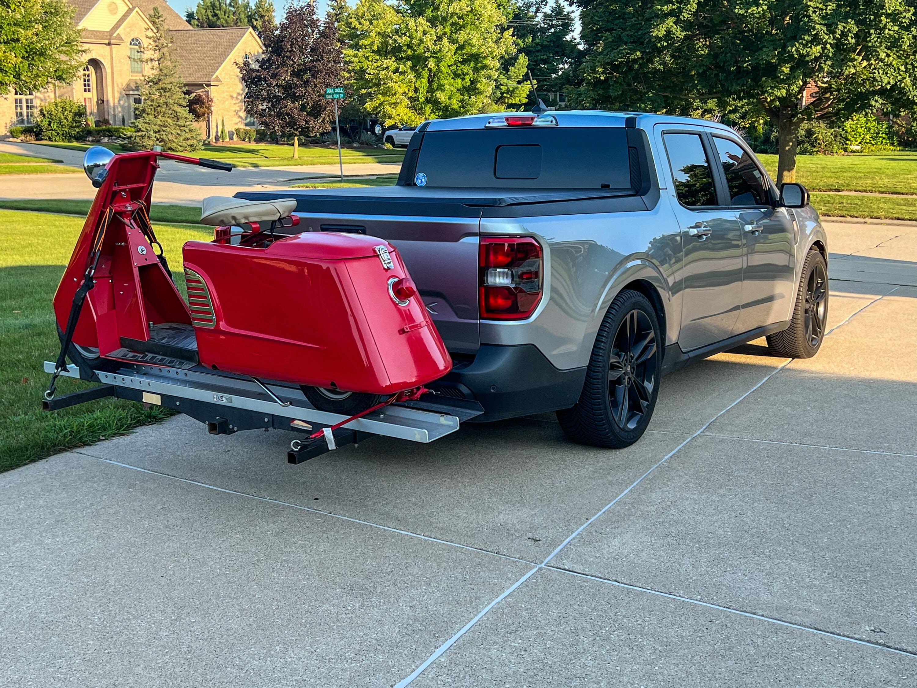 Ford Maverick Scooter hauling A483534A-ACF3-40C5-974E-29133D0360A8