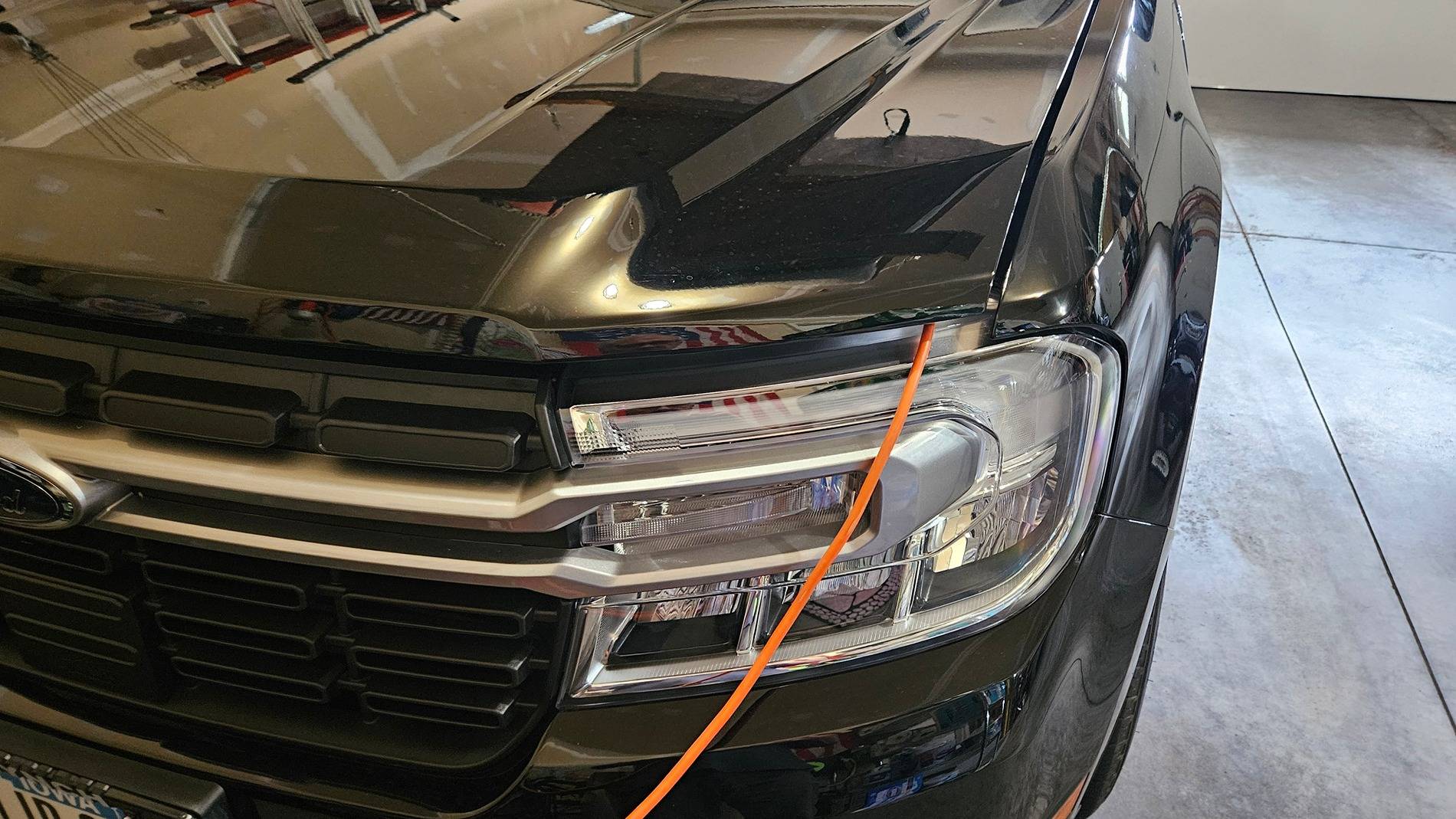 Noco plugged, hood ajar.jpg