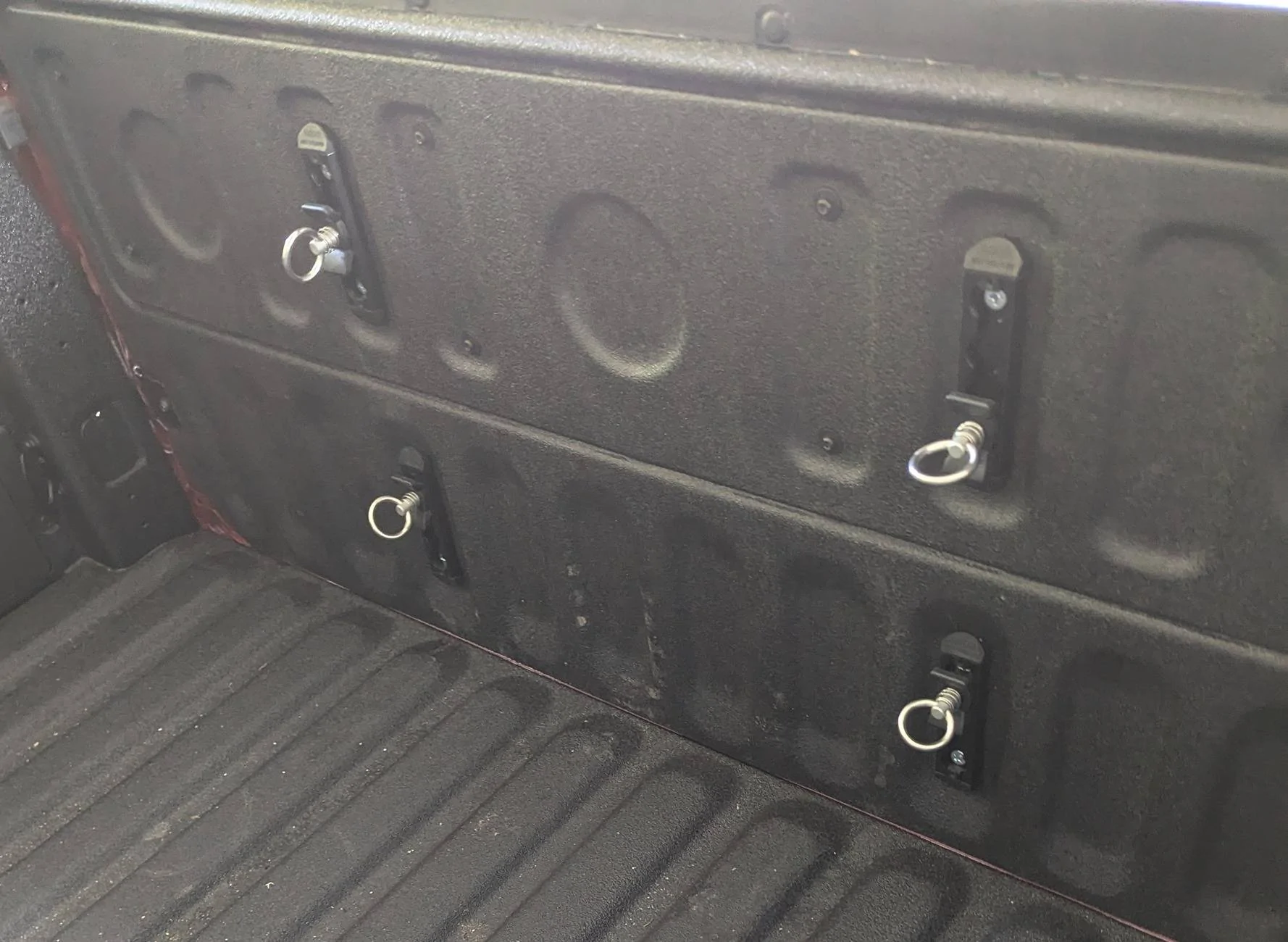 Ford Maverick Core Trax tie-downs in bottom half of tailgate 1000021658