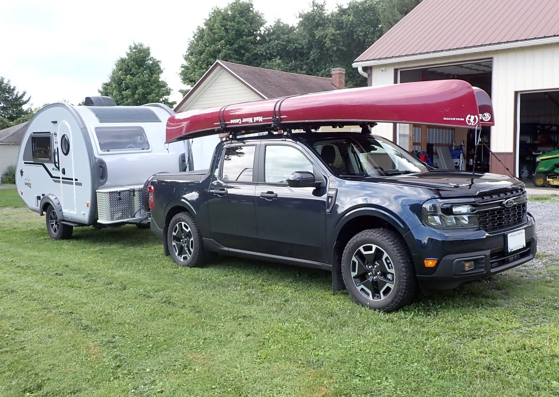Ford Maverick First trip towing our 14ft Travel Trailer canoes garage