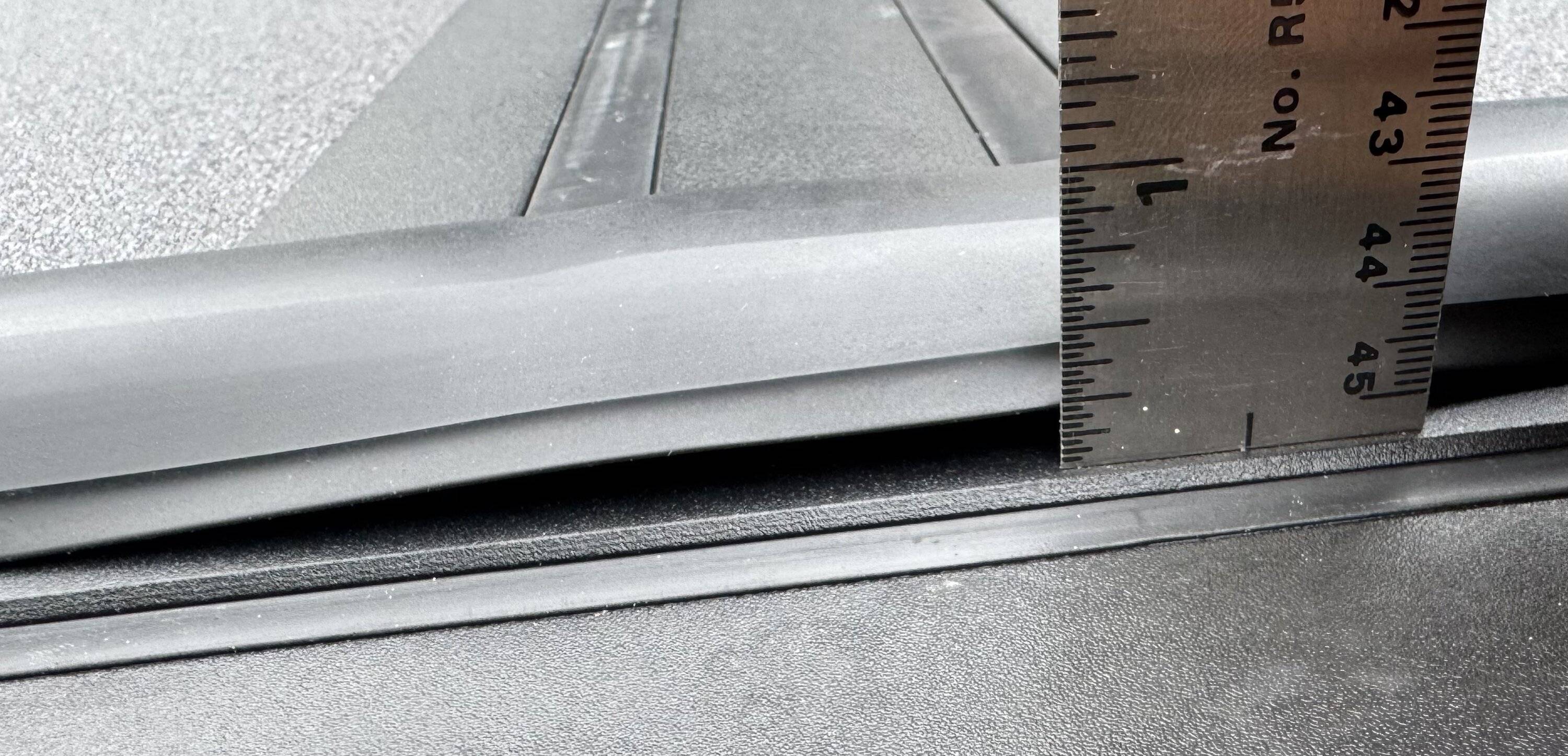Ford Maverick Newly Ford installed tri-fold rail Tonneau bed cover with weather seal sitting way proud of the surface below, at two cover folds 4_Ford_Maverick_2024_hard_tri-fold-Tonneau_bed cover_right_side