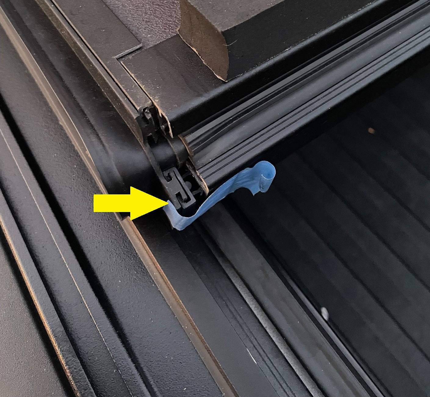 Ford Maverick Newly Ford installed tri-fold rail Tonneau bed cover with weather seal sitting way proud of the surface below, at two cover folds IMG_1040
