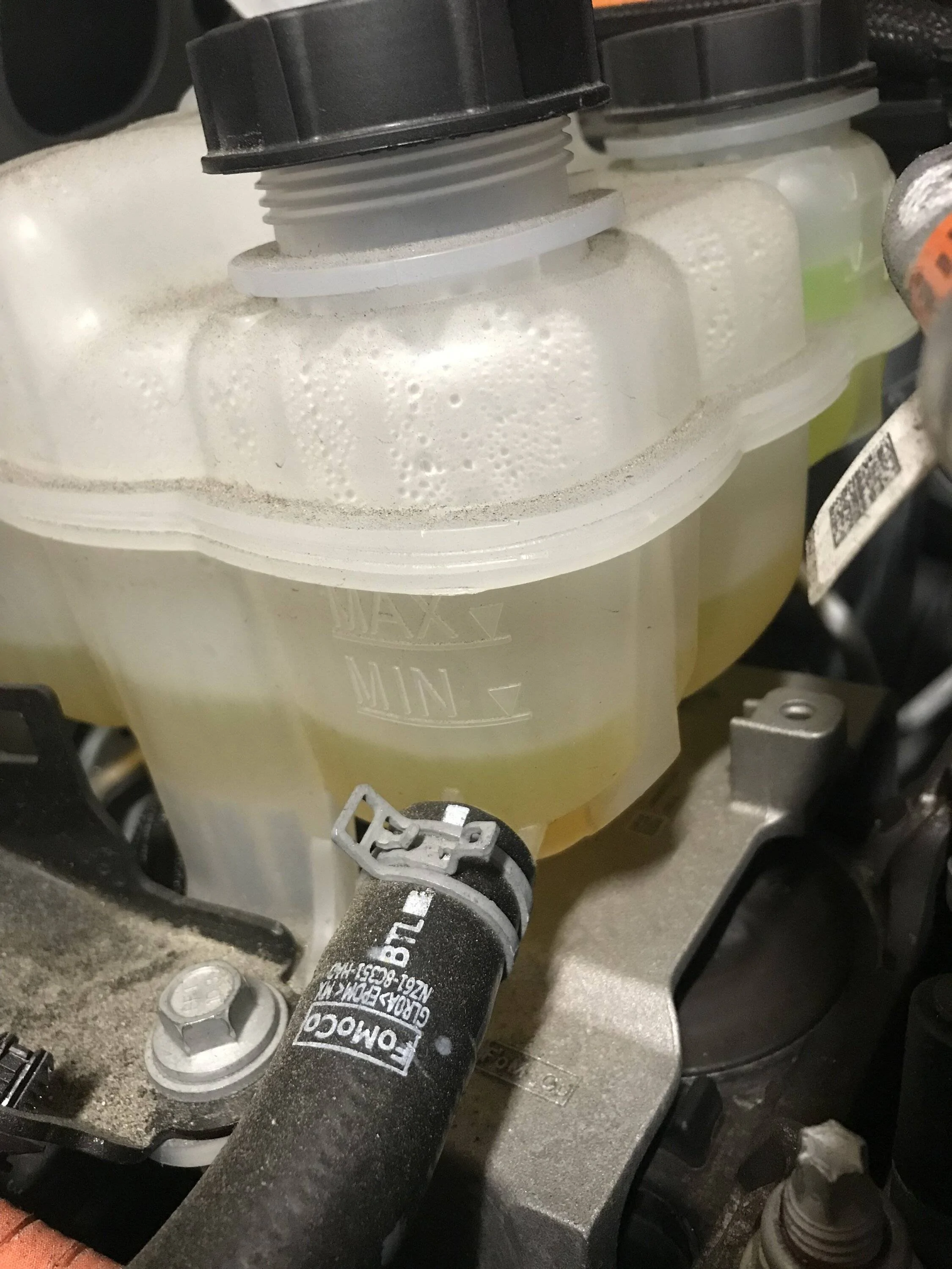 Ford Maverick 2022 Hybrid - First time topping off coolant but different color? IMG_7731