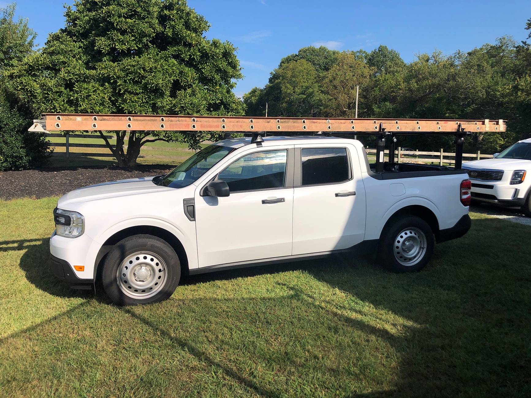 Ford Maverick Yakima Rail + AA-Racks = 40' Ladder Hauler Maverick with 40ft Ladder