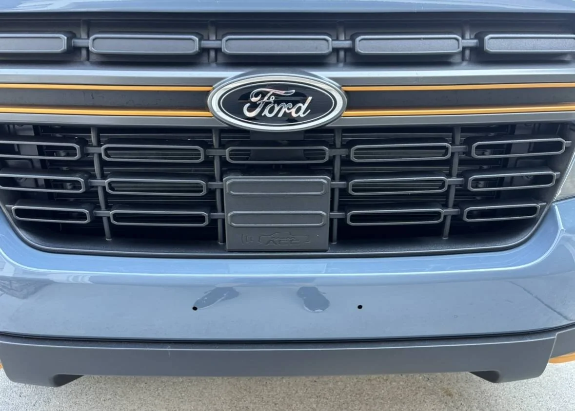 Ford Maverick Azure Gray Bumper Plugs - New IMG_4476