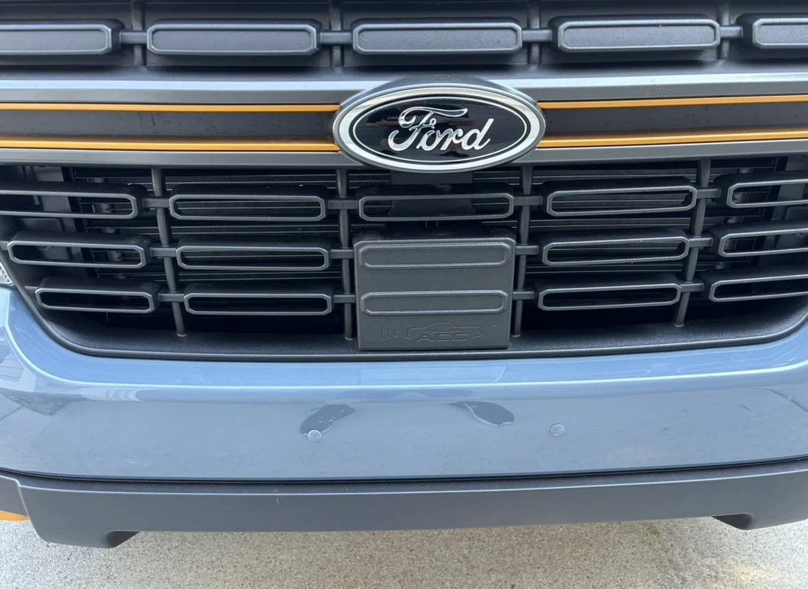 Ford Maverick Azure Gray Bumper Plugs - New IMG_4477