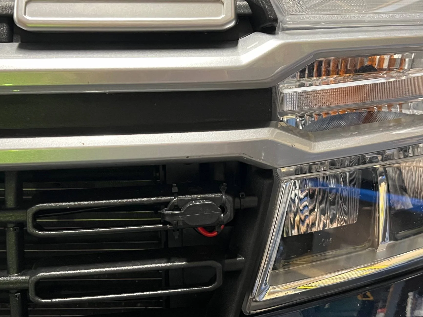 Ford Maverick Thread a wires behind grill IMG_8797