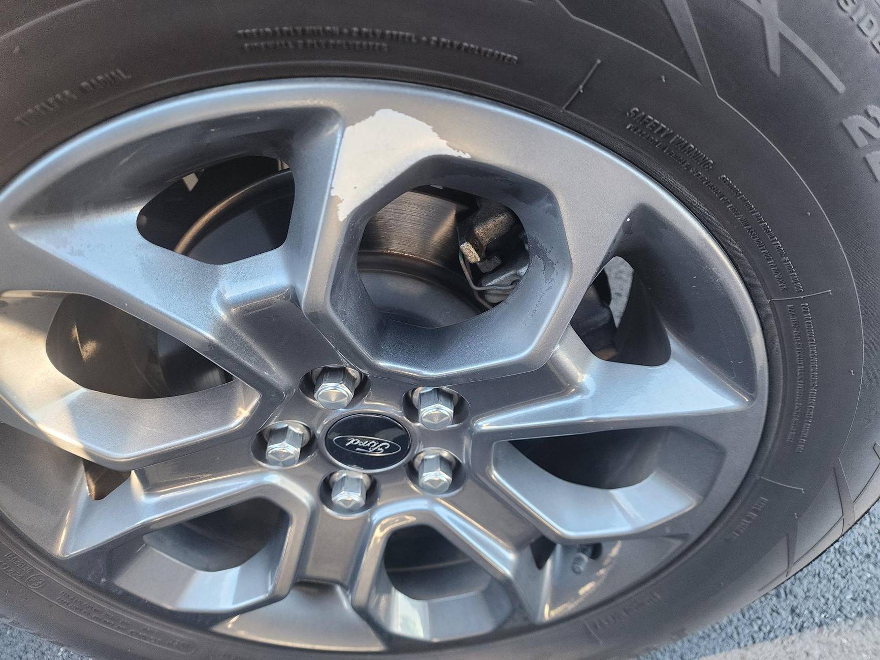 Ford Maverick XLT carbonized 17" wheel, paint flaking off  (Now with pics) 1000001246