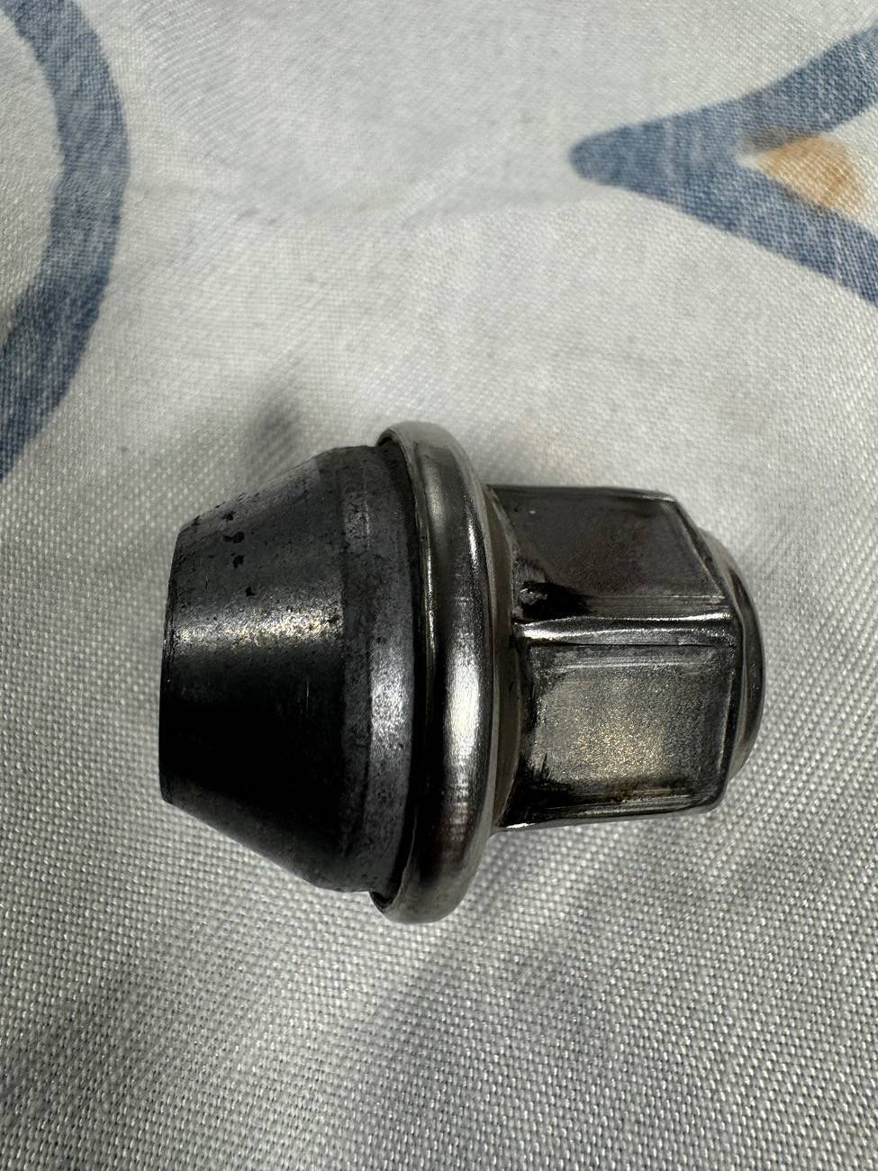 Ford Maverick Aren’t the OEM Lugs Conical Seat? IMG_2194