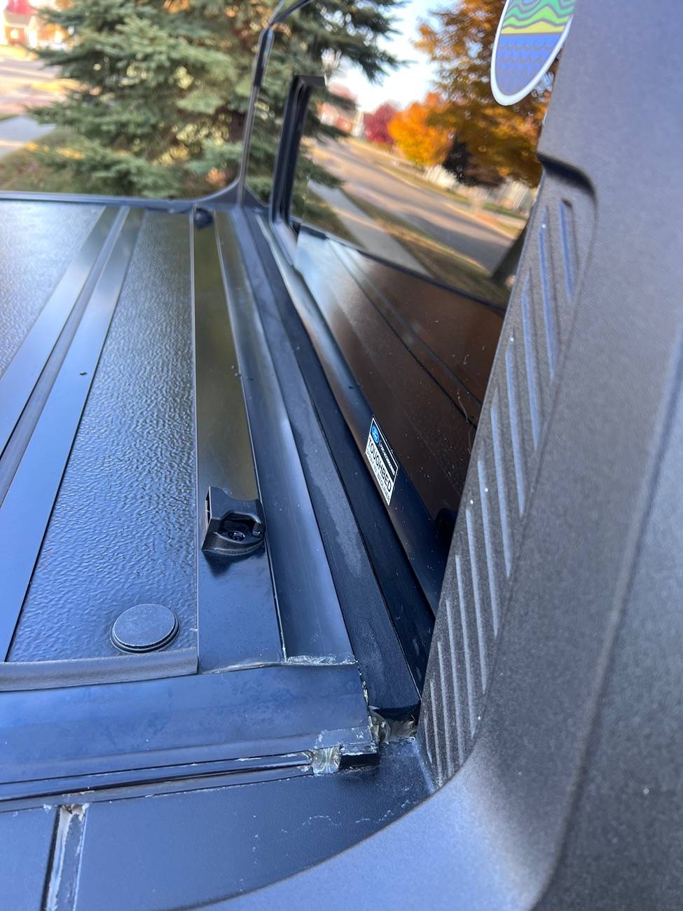 Ford Maverick Trash accumulated between my Tonneau cover and back glass! IMG_9080