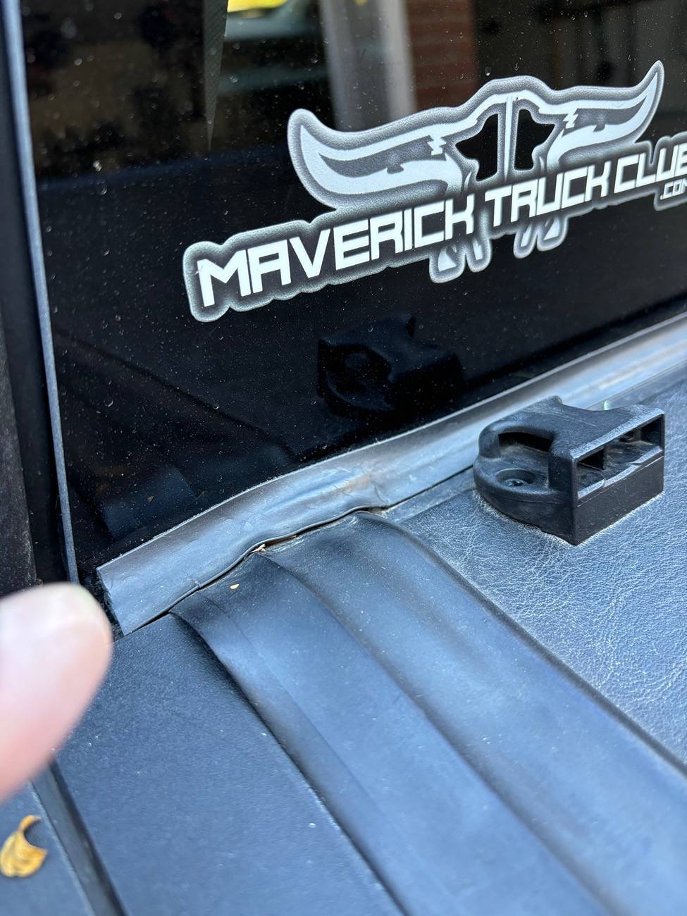 Ford Maverick Trash accumulated between my Tonneau cover and back glass! IMG_3885