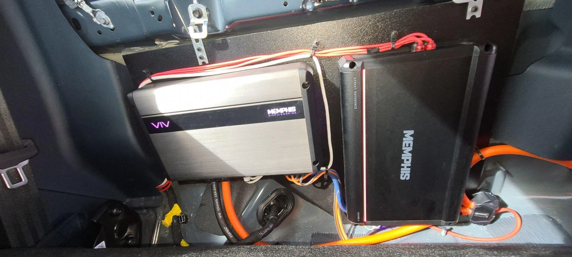 Ford Maverick Sound system upgraded - 2 memphis m7 10" subs on a viv220 under rear seats Resized_20211119_105432