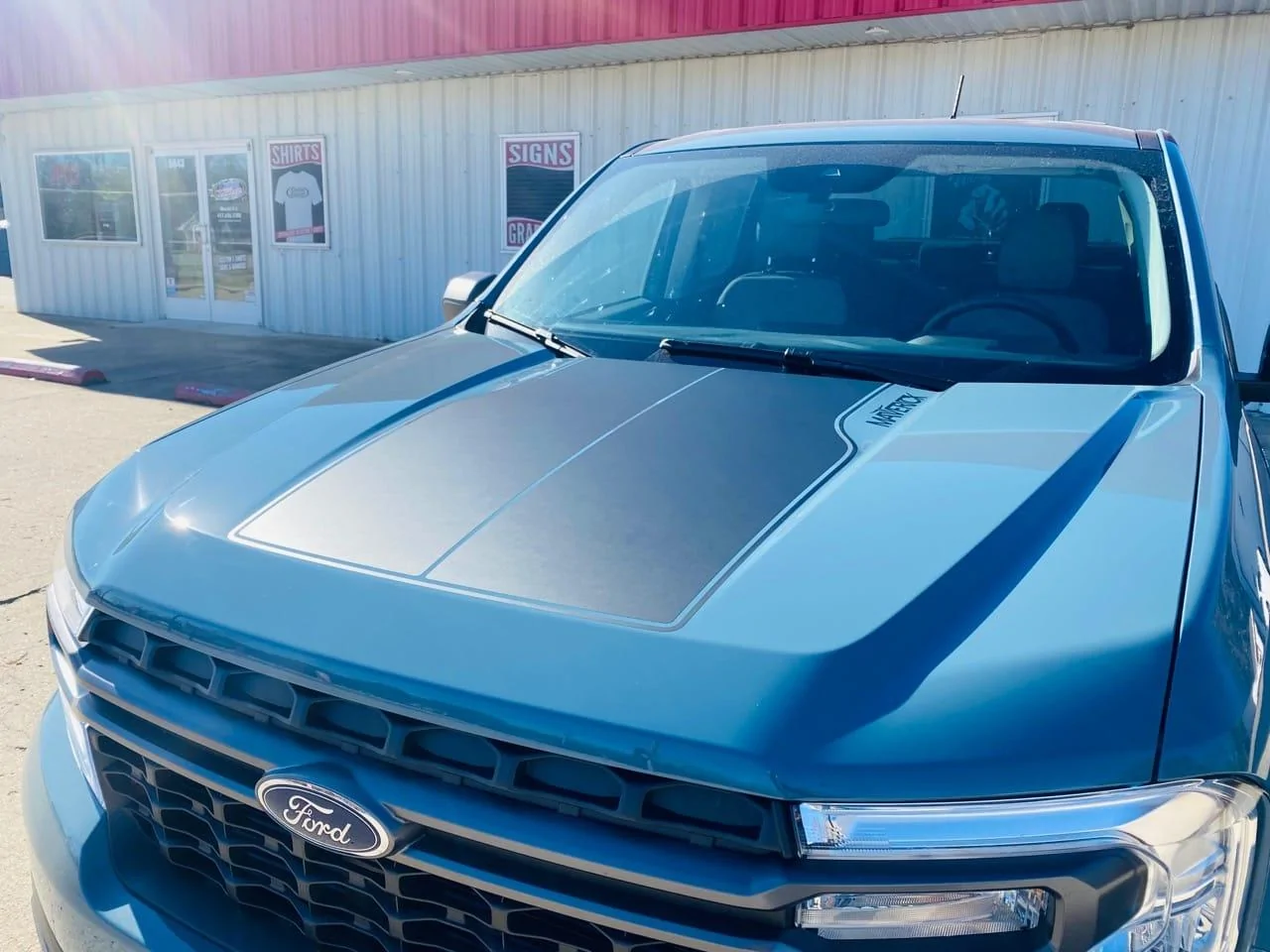 Ford Maverick White Lightning XL Has Arrived With Factory Hood Stripe, Decals & Parts Mav Hood