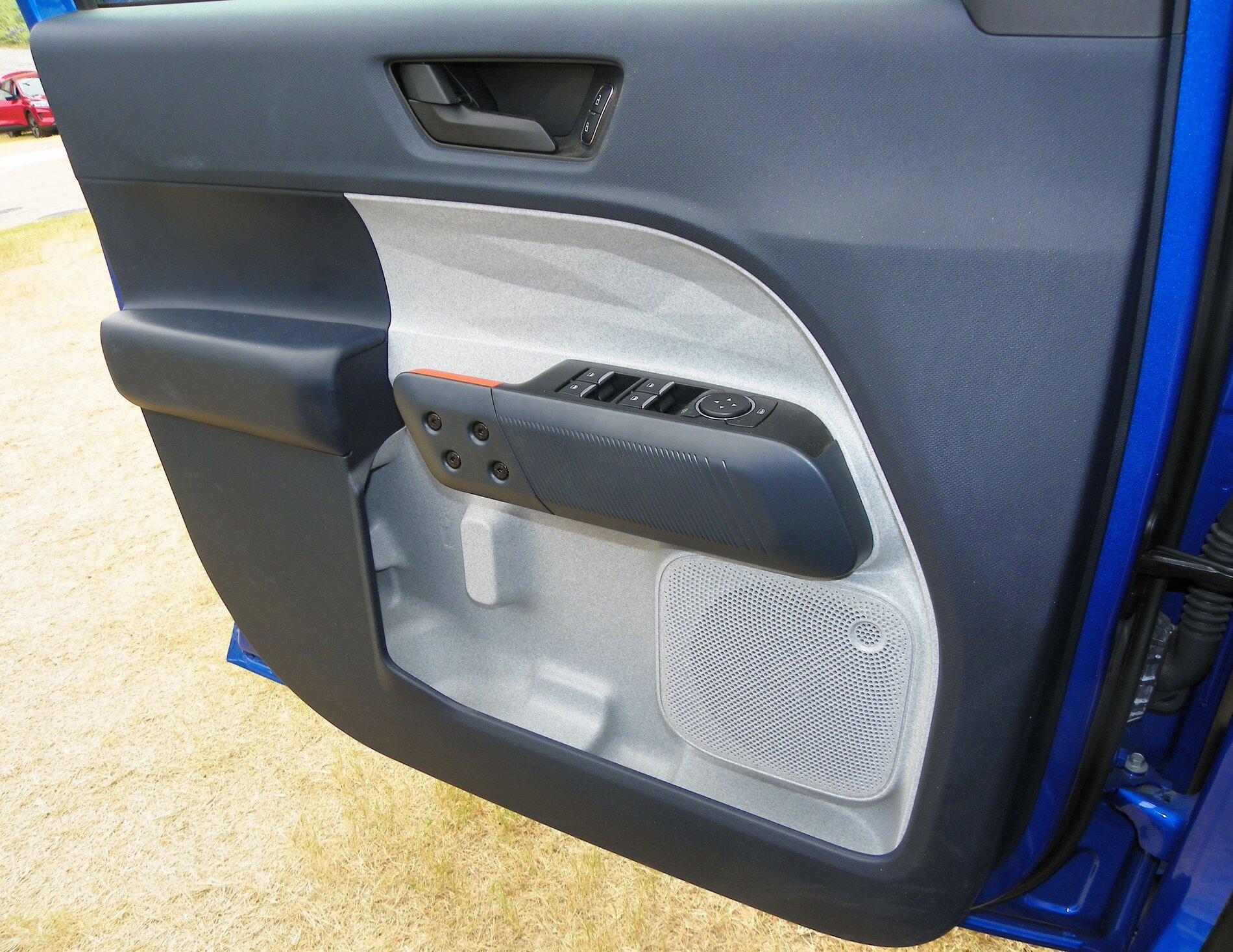Ford Maverick High quality XLT Interior photos? Front Door.JPG