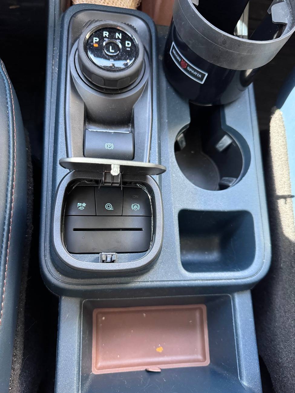 Ford Maverick Button cover for center console? Truck2