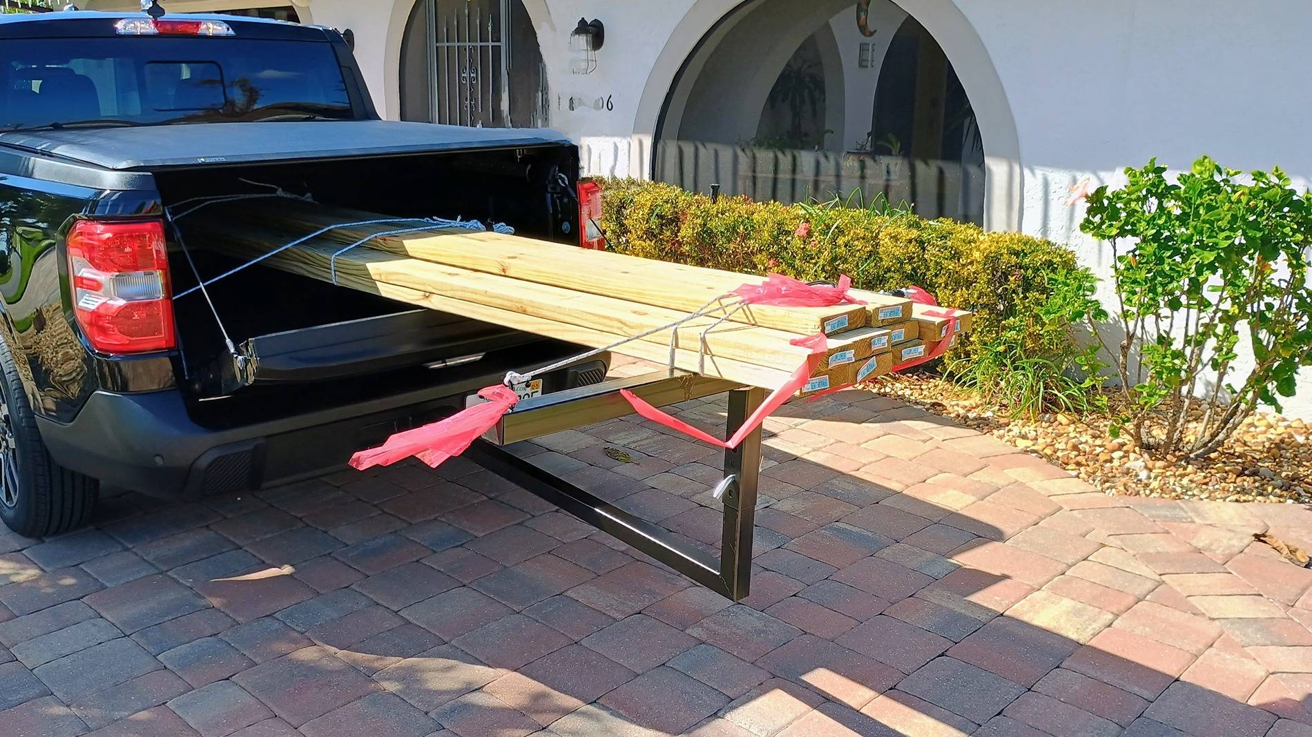 Ford Maverick Hauling long load: tailgate position? Hitch extender