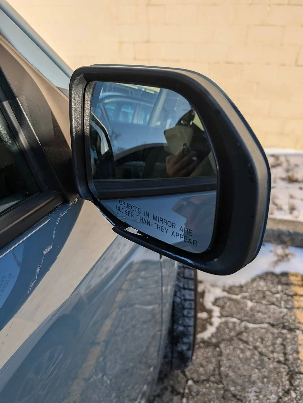 Ford Maverick Seeking suggestions on how to fix broken passenger side mirror trim 1000002729