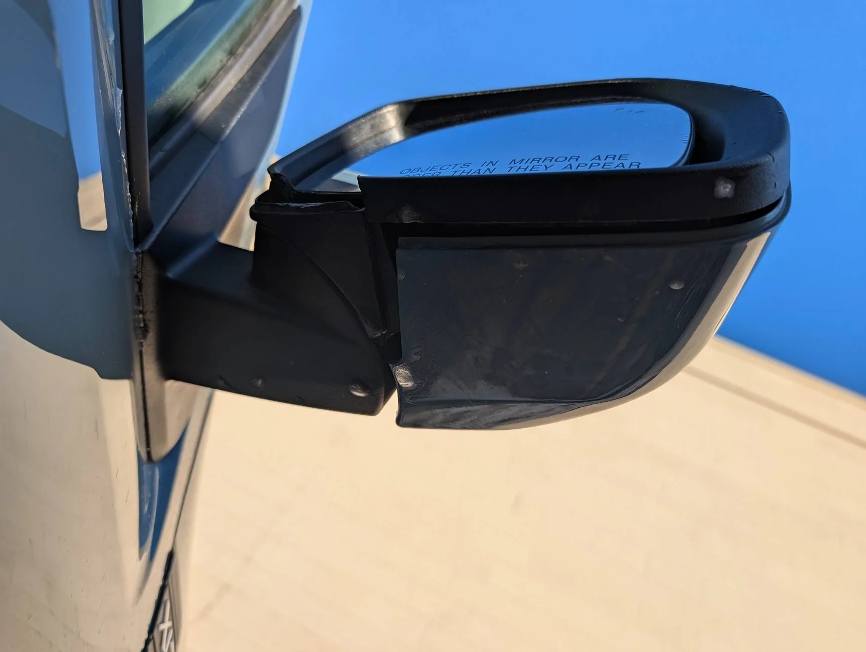 Ford Maverick Seeking suggestions on how to fix broken passenger side mirror trim 1000002730