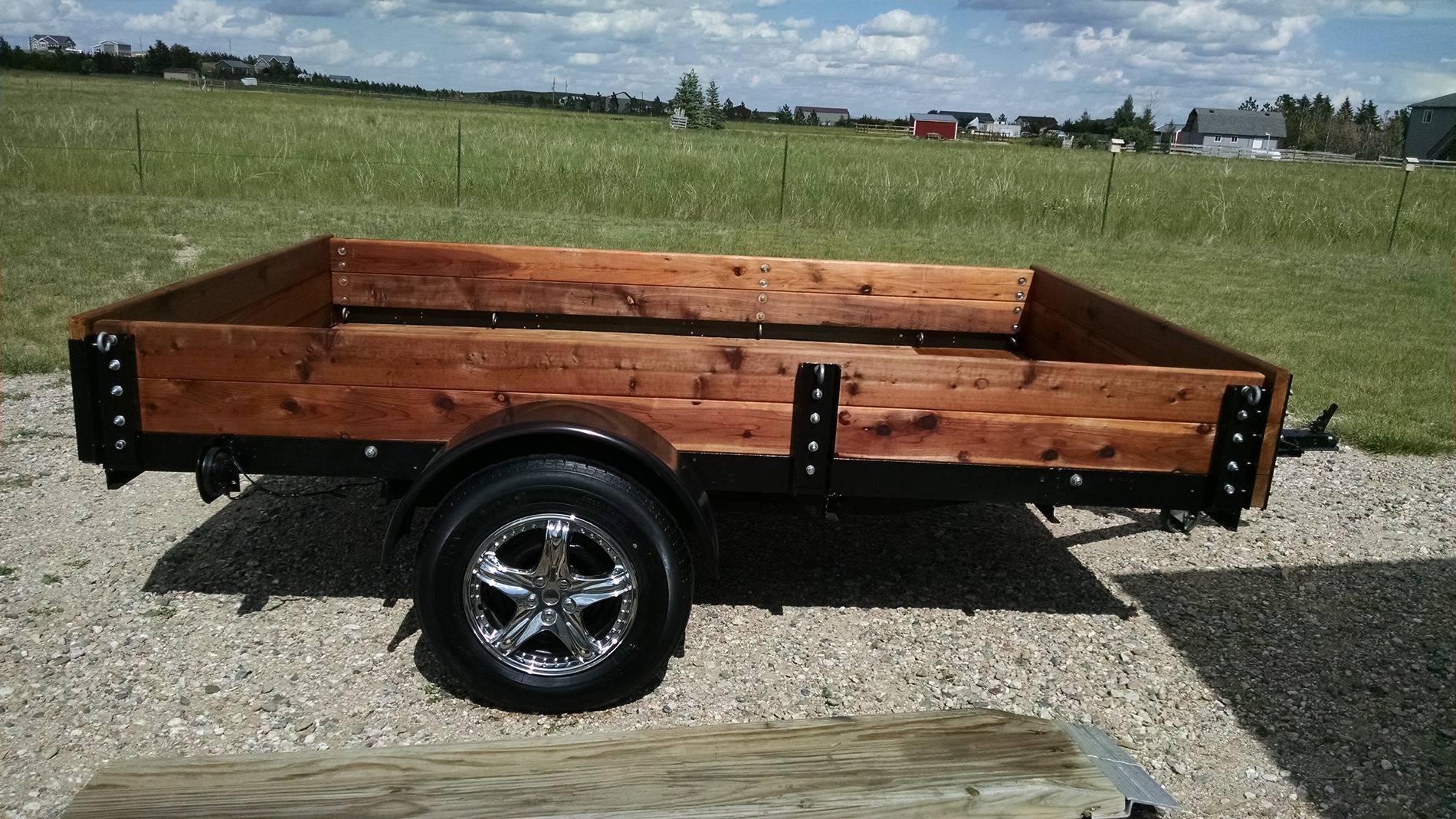 Ford Maverick Another Trick for Plywood Hauling trailer