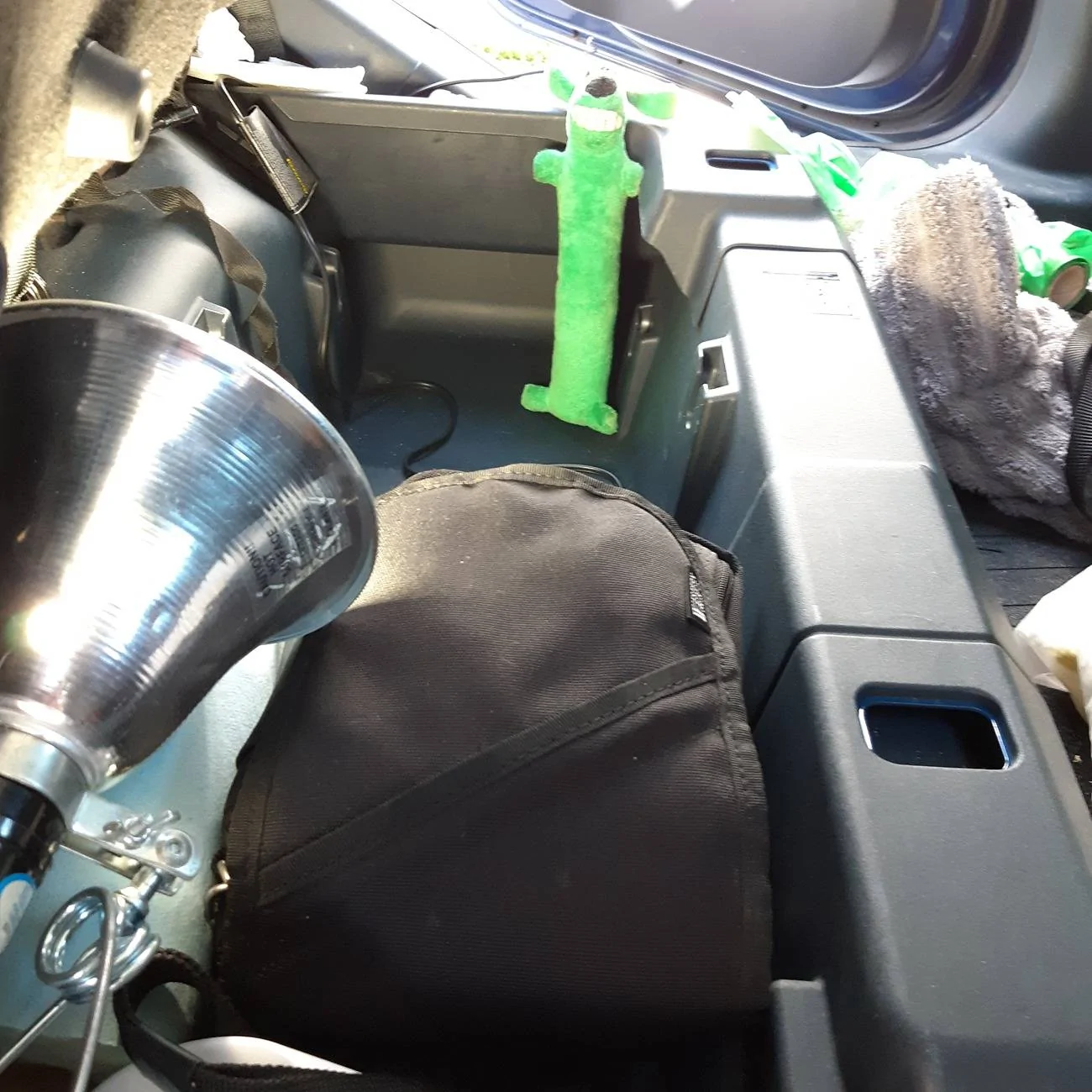 Ford Maverick Just noted hidden storage at ends of under rear seat storage area. 20250325_121621