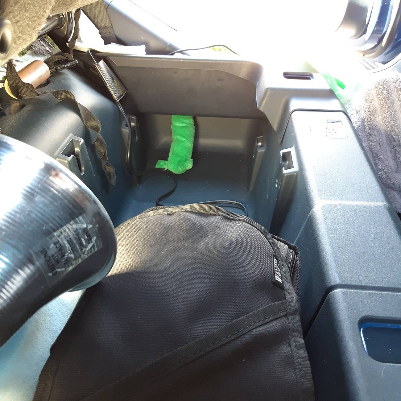 Ford Maverick Just noted hidden storage at ends of under rear seat storage area. 20250325_121719