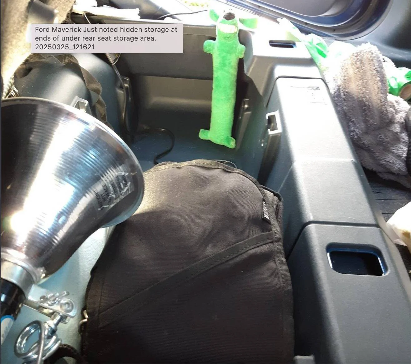 Ford Maverick Just noted hidden storage at ends of under rear seat storage area. Screen Shot 2025-03-25 at 10.13.56 PM