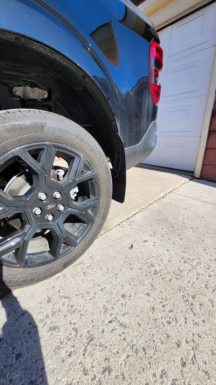 Ford Maverick Mabett Mud flaps and center console storage tray installed 20250406_155249