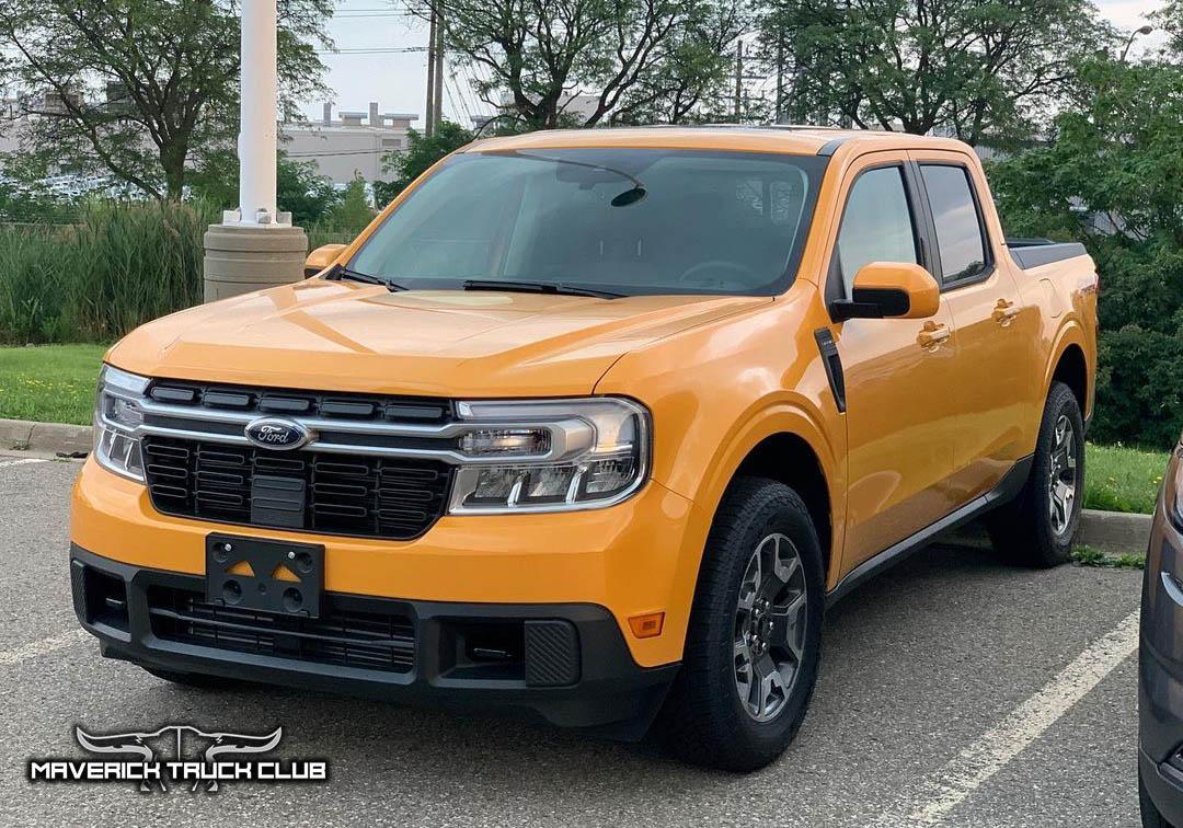 Ford Maverick Best Looks Yet at 2022 Maverick in Cyber Orange [Lariat FX4]. Front License Plate Holder Shown Cyber Orange 2022 Maverick Lariat FX4 