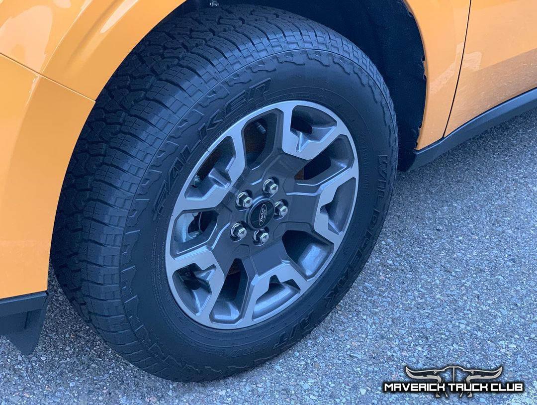 Ford Maverick Best Looks Yet at 2022 Maverick in Cyber Orange [Lariat FX4]. Front License Plate Holder Shown Cyber Orange 2022 Maverick Lariat FX4 2