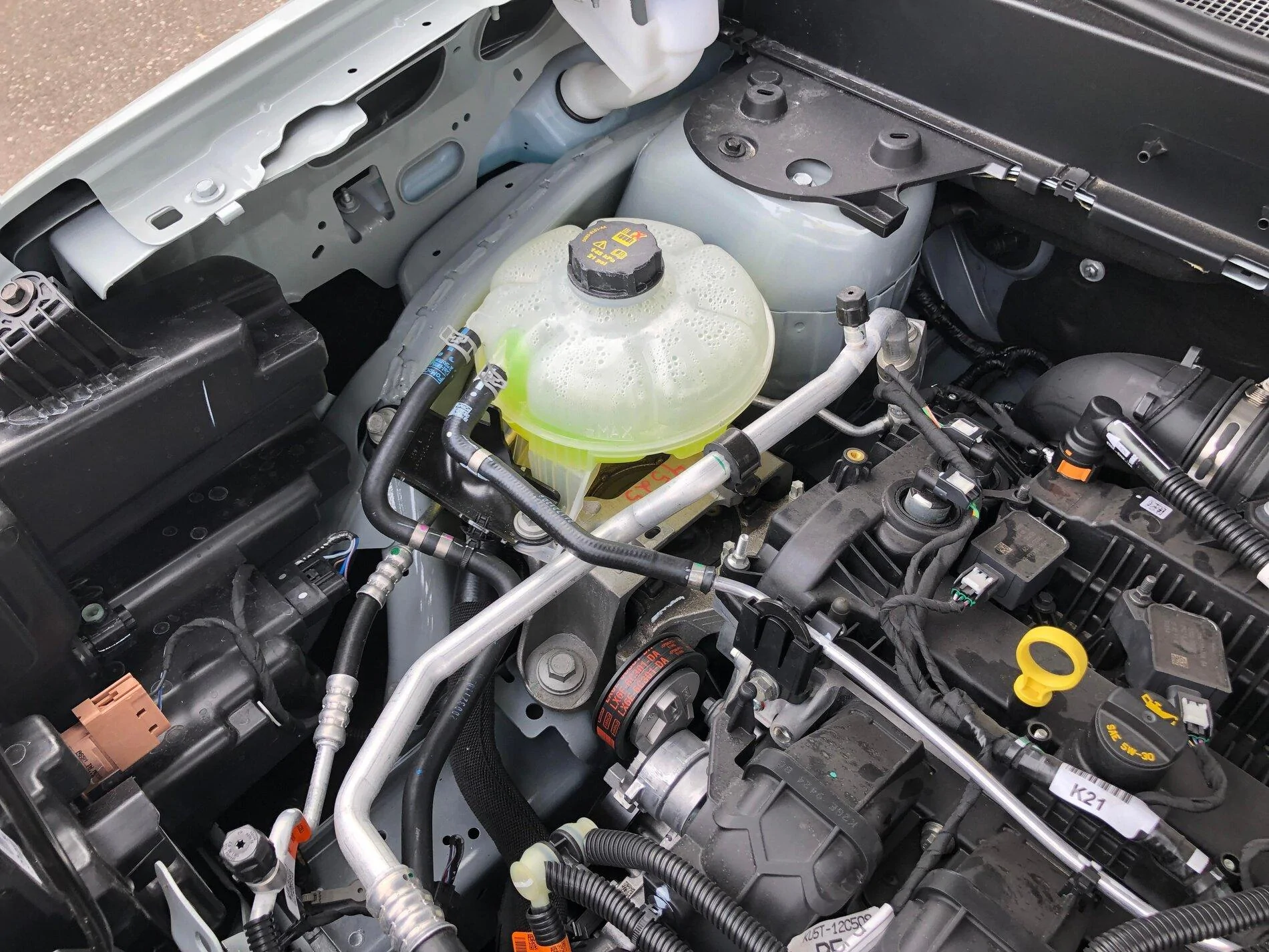 Ford Maverick Pics: Maverick Lariat in Cactus Gray - Next to F150, Interior, Engine Compartment, Spare Tire, Undercarriage 2022 Maverick 2.0L engine underhood engine compartment 1