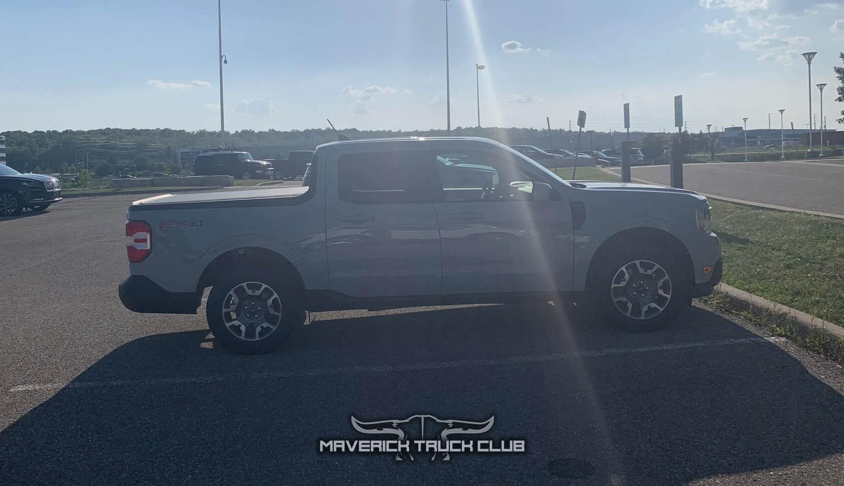 Ford Maverick 2022 Maverick colors compared in lineup featuring: Cyber Orange, Alto Blue, Hot Pepper Red, Area 51, Cactus Gray Cactus Gray Maverick XLT 3