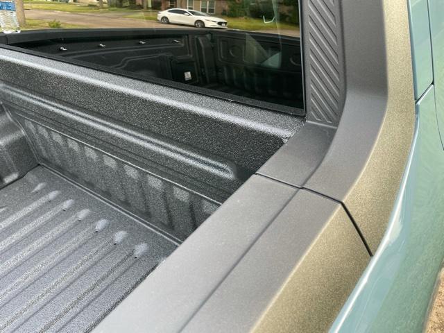 Ford Maverick Spray in bedliner and tie down eye bolts added. image1