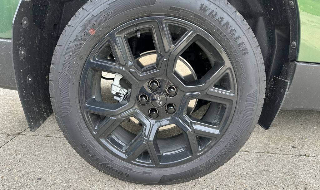 Ford Maverick Black lug nuts with BAP, should have been standard! img_9875