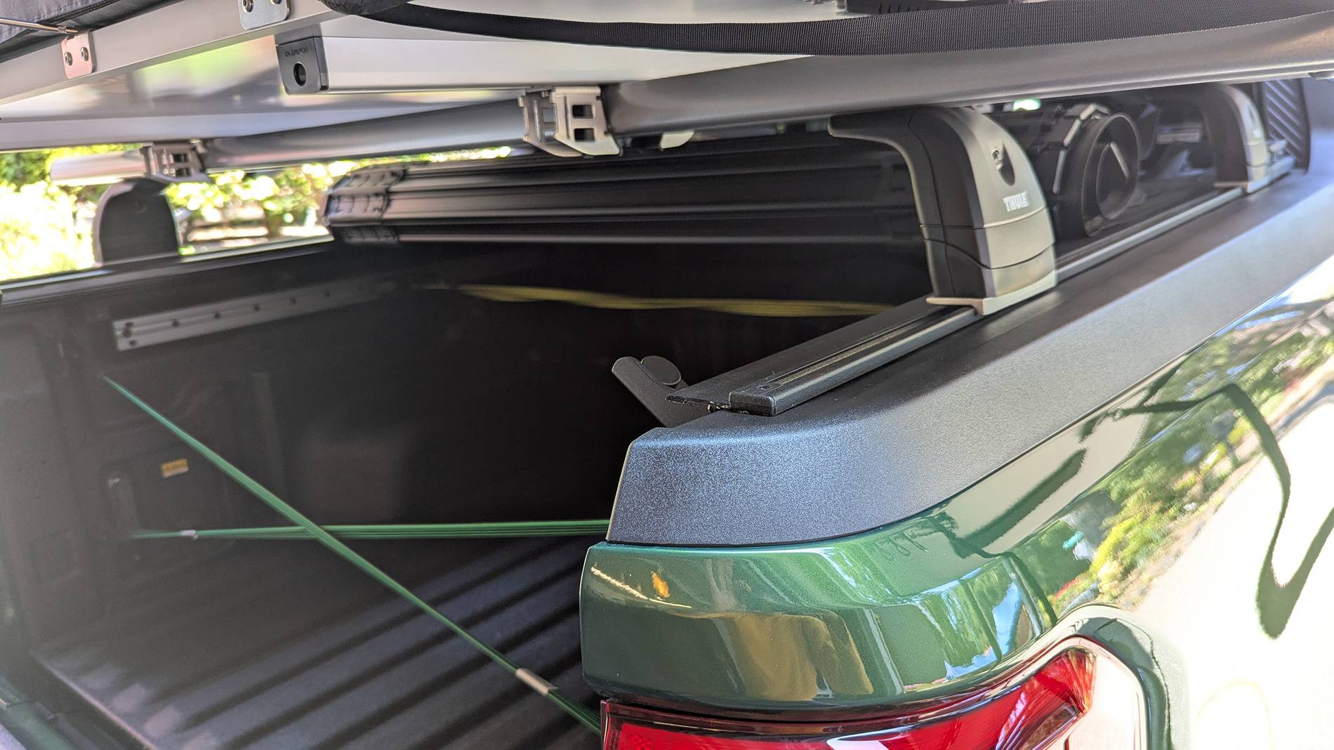 Ford Maverick RTT iKamper roof top tent with Thule Aerobars over a BAK Revolver X4S with tracks. PXL_20250424_212941050