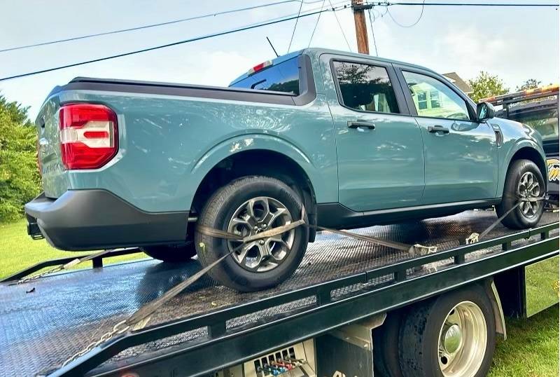 Ford Maverick Would you buy hybrid again yes or no Truck on Rollback.JPEG