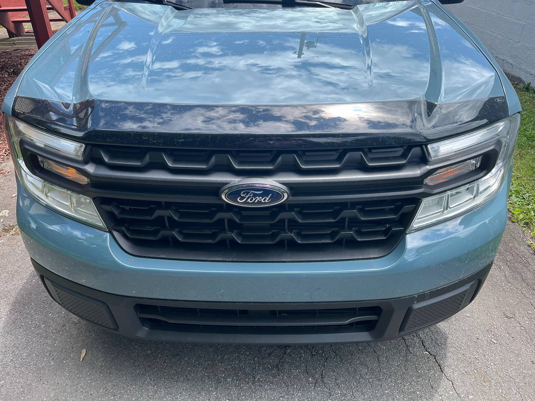 Ford Maverick Added Bugflector II, shorter lugs and Veteran Edition badges IMG_1106.JPG