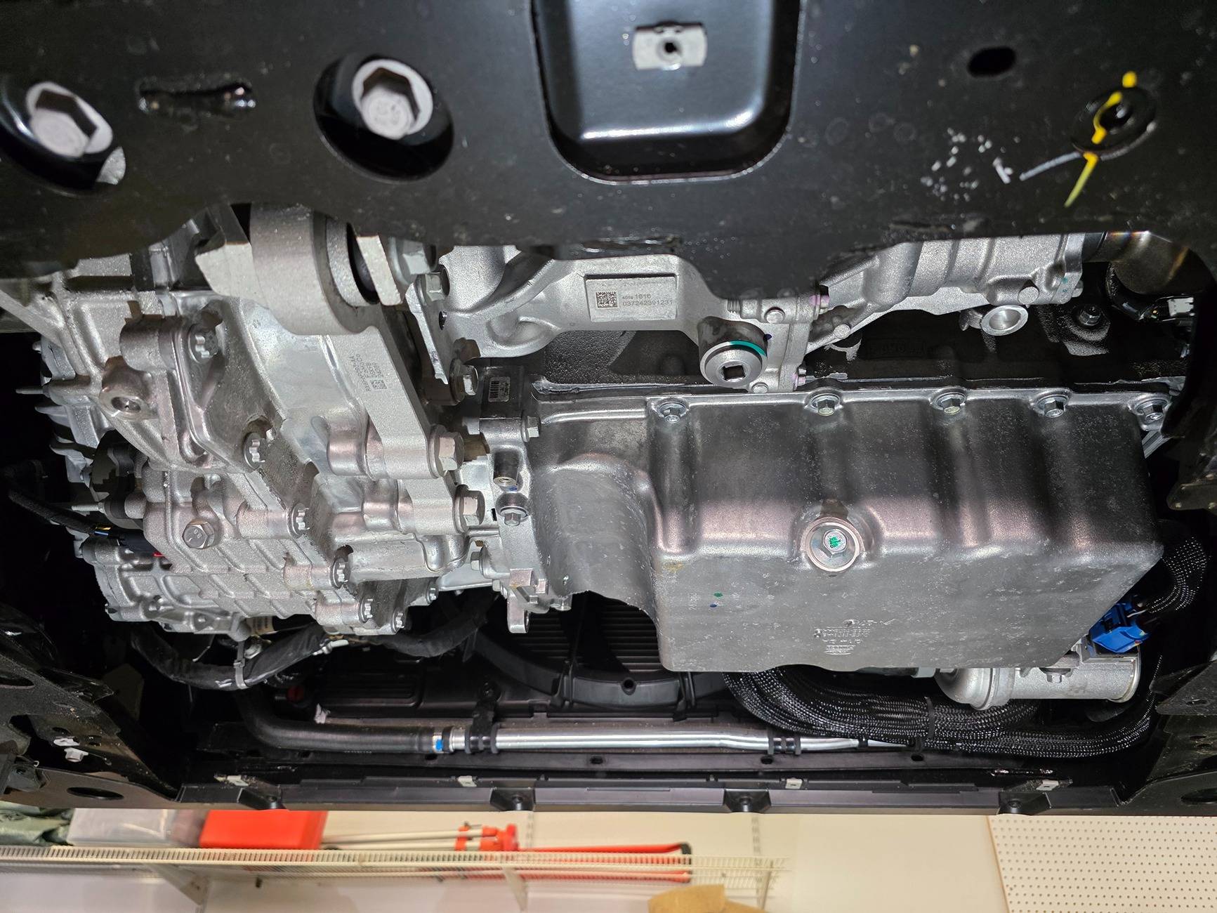 Ford Maverick 2025 Hybrid AWD underside pictures. Engine and PTU oil drains 