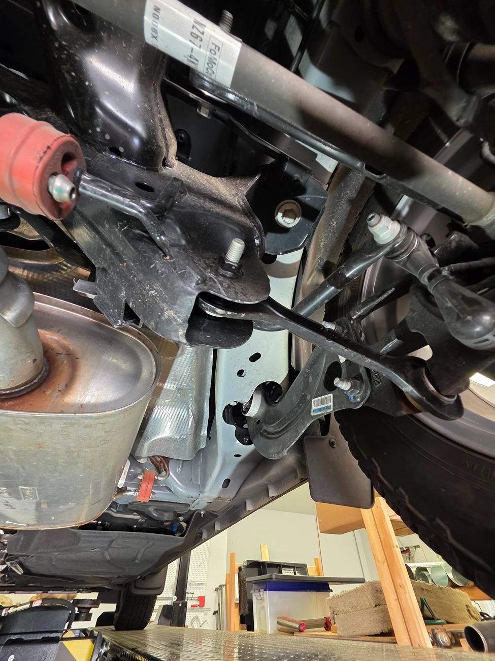 Ford Maverick 2025 Hybrid AWD underside pictures. Front lower rear control arms