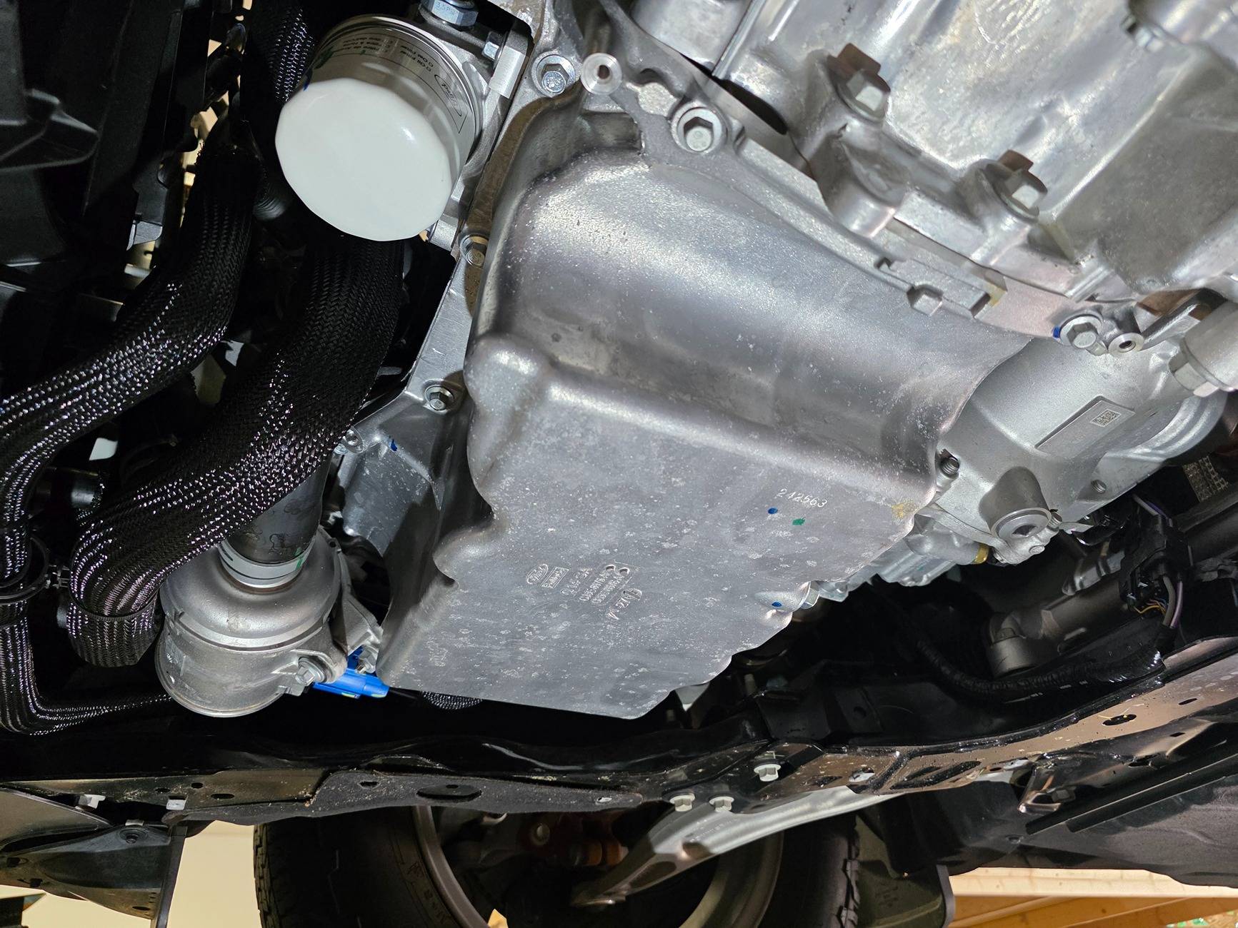 Ford Maverick 2025 Hybrid AWD underside pictures. Oil pan water pump  PTU