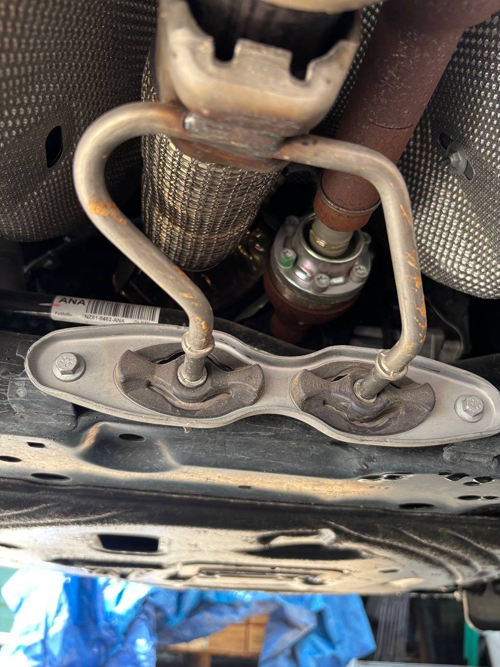 Ford Maverick Noise behind catalytic converter tail pipe hanger