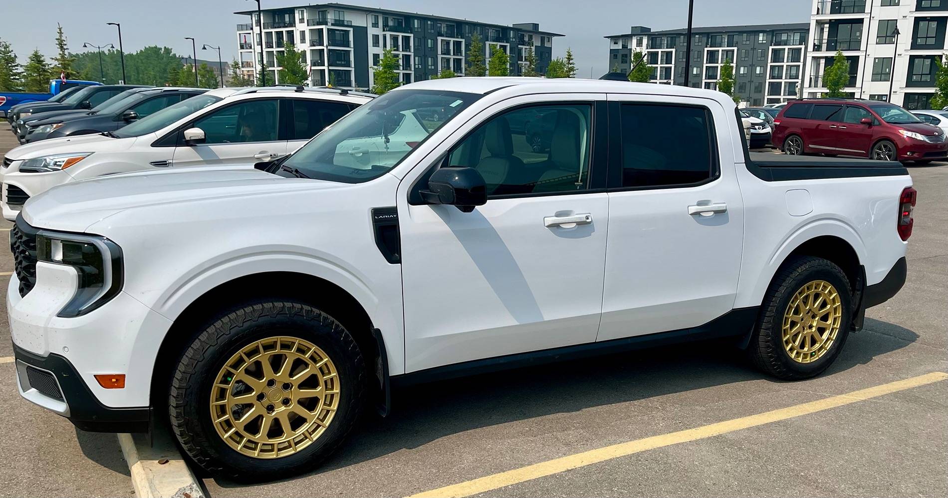 Ford Maverick Black Rhino Gold Boxer Wheels on White '25 Lariat IMG_2017